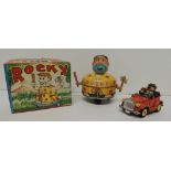 A Japanese made battery operated tinplate and rubber "Rocky" toy in original box together with an