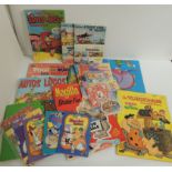A Federal Comics Barney & Betty comic book; a Flintstones Coloring Book; Magilla Gorilla Sticker