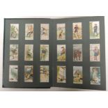 GALLAHER - Boy Scouts, grey green backs (100/100) in an old slot in album with picture of boy