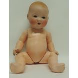 An Armand Marseille My Dream Baby bisque socket head doll"AM Germany 351/ 6K impressed having