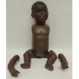 An Armand Marseille black bisque socket head doll impressed "AM Germany 362/6K" having painted