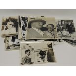 A quantity of black and white press photographs of Charlie Chaplin and his family including some