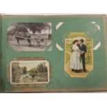 An album of approx 112 early 20th Century postcards including chromo litho greetings, Christmas,