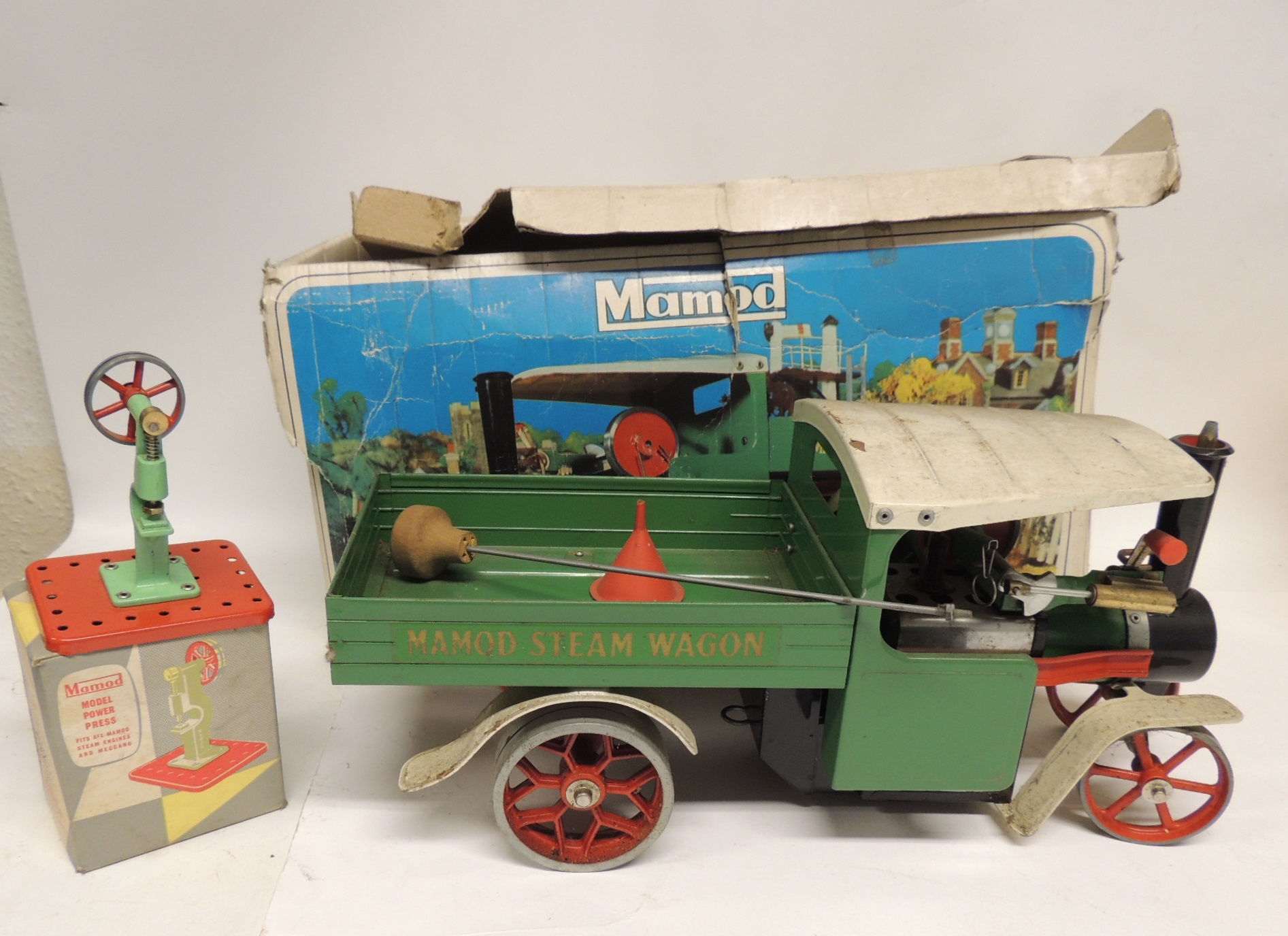 A Mamod Steam Wagon in original box together with steering rod, funnel and burner together with a