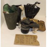 Four gas masks in cases together with Anti-Gas Eyeshields in card case