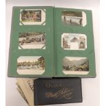 An album of approx 133 early 20th Century postcards including many foreign including chromo litho