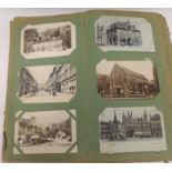 An album of approx 380 assorted early 20th Century postcards includes photo topo Peterborough,