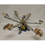 A Meccano mechanical display model of a fairground ride "Octopus", constructed with spinning seats