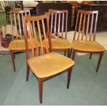 A set of four G Plan teak rail back dining chairs with gold cord upholstered seats