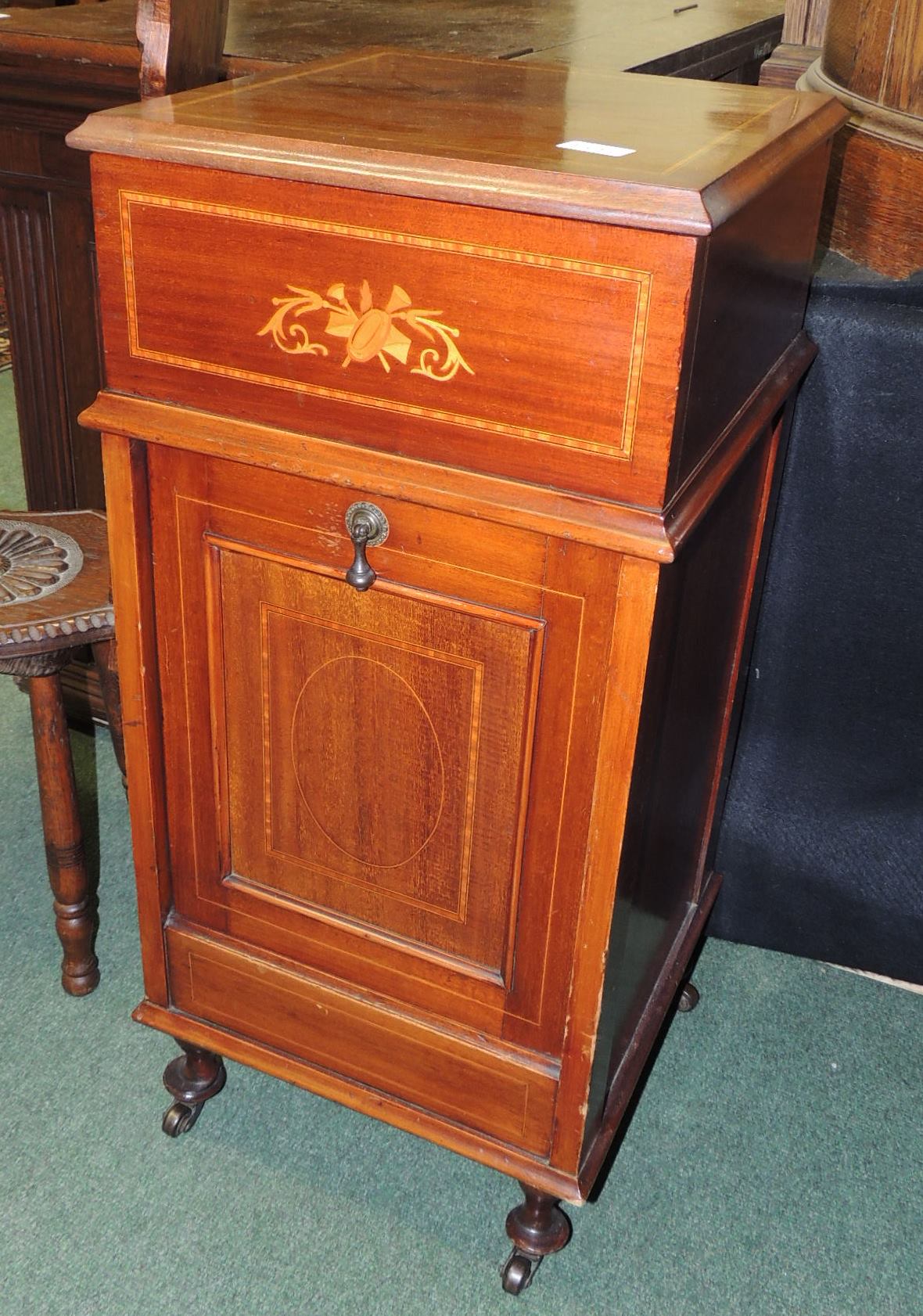 An Edwardian inlaid mahogany work box/coal purdonium, the hinged top enclosing green silk