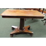 A Victorian mahogany pedestal reading/tea table, the rectangular top with two adjustable lectern