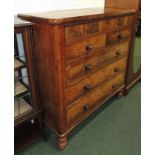 A Victorian mahogany chest of drawers, fitted with long top drawer above two short and three long
