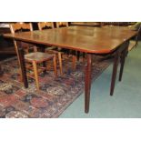 A 19th century mahogany, rectangular, drop flap dining table on square tapering supports, 168.5cm