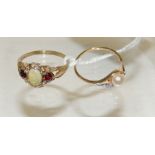 A 9ct gold dress ring of cross-over style, set with a central cultured pearl, and with a tiny