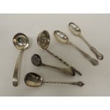 A Victorian sifter spoon with apostle terminal, twisted shaft and pierced and embossed bowl,