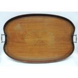 An early 20th Century shaped rectangular mahogany tray with brass handles and with central inlaid