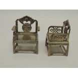 A pair of 19th Century Chinese miniature silver chairs by Kwan Wo, with decorative backs cast with