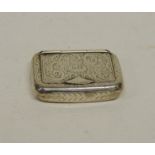 A Victorian silver snuff box having scrolling foliate engraved decoration, the hinged lid engraved