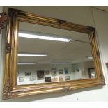 A modern rectangular gilt frame wall mirror, 79cm x 110cm.
