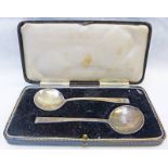 PAIR OF CASED SILVER SPOONS