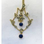 EDWARDIAN SEED PEARL & AMETHYST OPEN WORK PENDANT MARKED 15CT ON FINE CHAIN