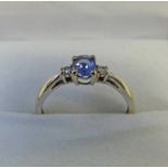 9CT GOLD DIAMOND & TANZANITE RING