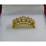 18CT GOLD AND DIAMOND 14 STONE RING Condition Report: Ring size: K.