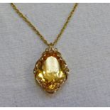 CITRINE PENDANT IN DECORATIVE CLAW SETTING MARKED 9K & ON FANCY LINK CHAIN MARKED 375