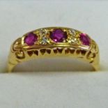 18CT GOLD RUBY & DIAMOND BOAT-SHAPED RING