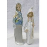 TWO LLADRO PORCELAIN FIGURES DEPICTING A GIRL HOLDING FLOWERS TOGETHER WITH A GIRL DRESSED IN A