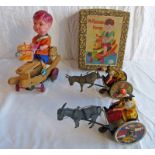 TWO LEHMANN TINPLATE CLOWNS ON HORSE DRAWN CARTS TOGETHER WITH JAPANESE TINPLATE BOY ON WOODEN