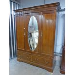 LATE 19TH CENTURY INLAID MAHOGANY TRIPLE DOOR WARDROBE THE CENTRAL DOOR WITH OVAL MIRROR,