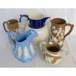 5 VARIOUS 19TH CENTURY POTTERY JUGS WITH RELIEF MOULDED DECORATION