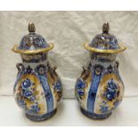 PAIR OF LOSOLWARE LIDDED AND HANDLED VASES WITH BLUE AND GILT FLORAL DECORATION,