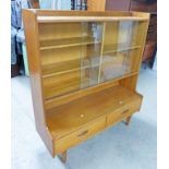 LATE 20TH CENTURY TEAK BOOKCASE WITH GLASS SLIDING DOORS