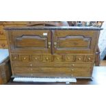 TABLE TOP HARDWOOD CABINET WITH 2 PANEL DOORS OVER MULTI DRAWERS