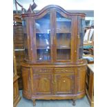 TEAK CABINET WITH 2 GLASS PANEL DOORS FLANKED BY 2 BOW DOORS OVER 4 DOORS WITH CARVED DECORATION