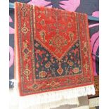 RED AND BLACK EASTERN RUG 136 X 69CM