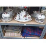 ROYAL NORFOLK DINNER & TEA SERVICE DECORATED WITH ROSES & FOUR TRAVEL RUGS OVER TWO SHELVES