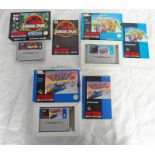 THREE NINTENDO SNES GAMES INCLUDING SUPER MARIO KART, JURASSIC PARK & F-ZERO.