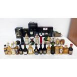 GOOD SELECTION OF MINIATURES TO INCLUDE VARIOUS PORT BOX SETS, FAMOUS GROUSE, BELLS,