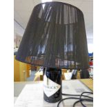 HENDRICKS TABLE LAMP WITH BLACK SHADE.