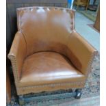 20TH CENTURY LEATHER & OAK CLUB CHAIR WITH STUD DECORATION