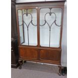 EARLY 20TH CENTURY MAHOGANY DISPLAY CASE WITH 2 GLAZED DOORS OVER 2 PANEL DOORS ON BALL & CLAW