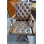 20TH CENTURY MAHOGANY BUTTON BACK SWIVEL DECK CHAIR