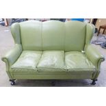 EARLY 20TH CENTURY GREEN LEATHER 3 SEAT SETTEE ON BALL & CLAW SUPPORTS