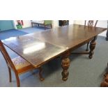 EARLY 20TH CENTURY OAK PULL-OUT DINING TABLE ON BALUSTER SUPPORTS