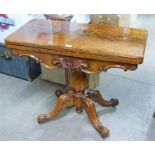 19TH CENTURY MAHOGANY FOLD OVER TEA TABLE WITH CARVED DECORATION & PEDESTAL BASE & SPREADING