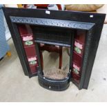 CAST IRON FIRE SURROUND WITH TILE INSERTS