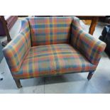 19TH CENTURY OVERSTUFFED WINDOW SEAT ON SQUARE SUPPORTS IN TARTAN CHECK